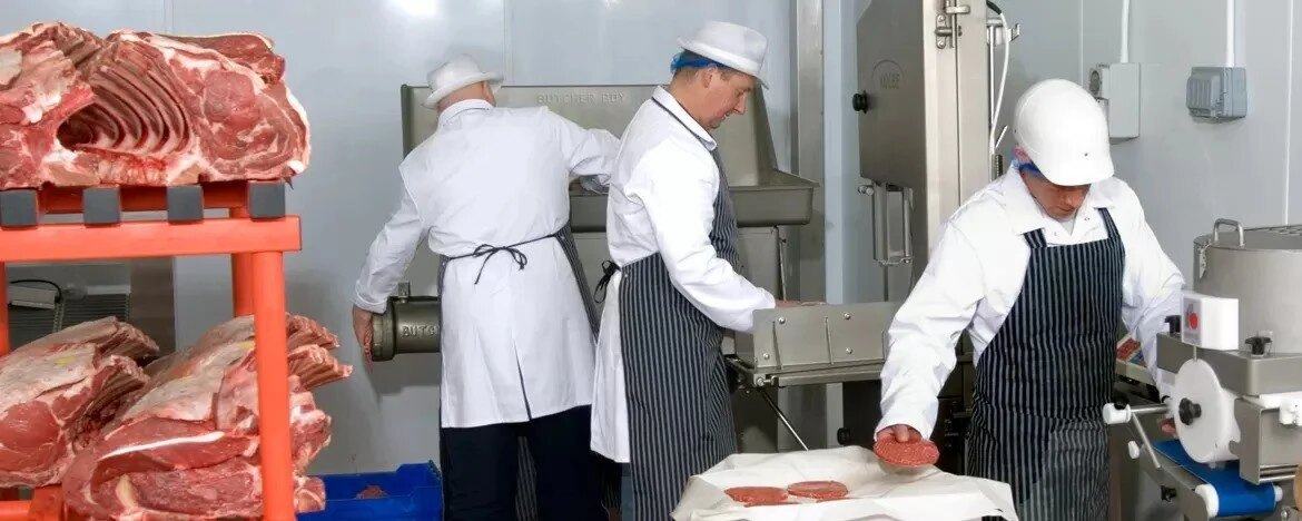 Bodiam Foods butchers at work in the cutting room